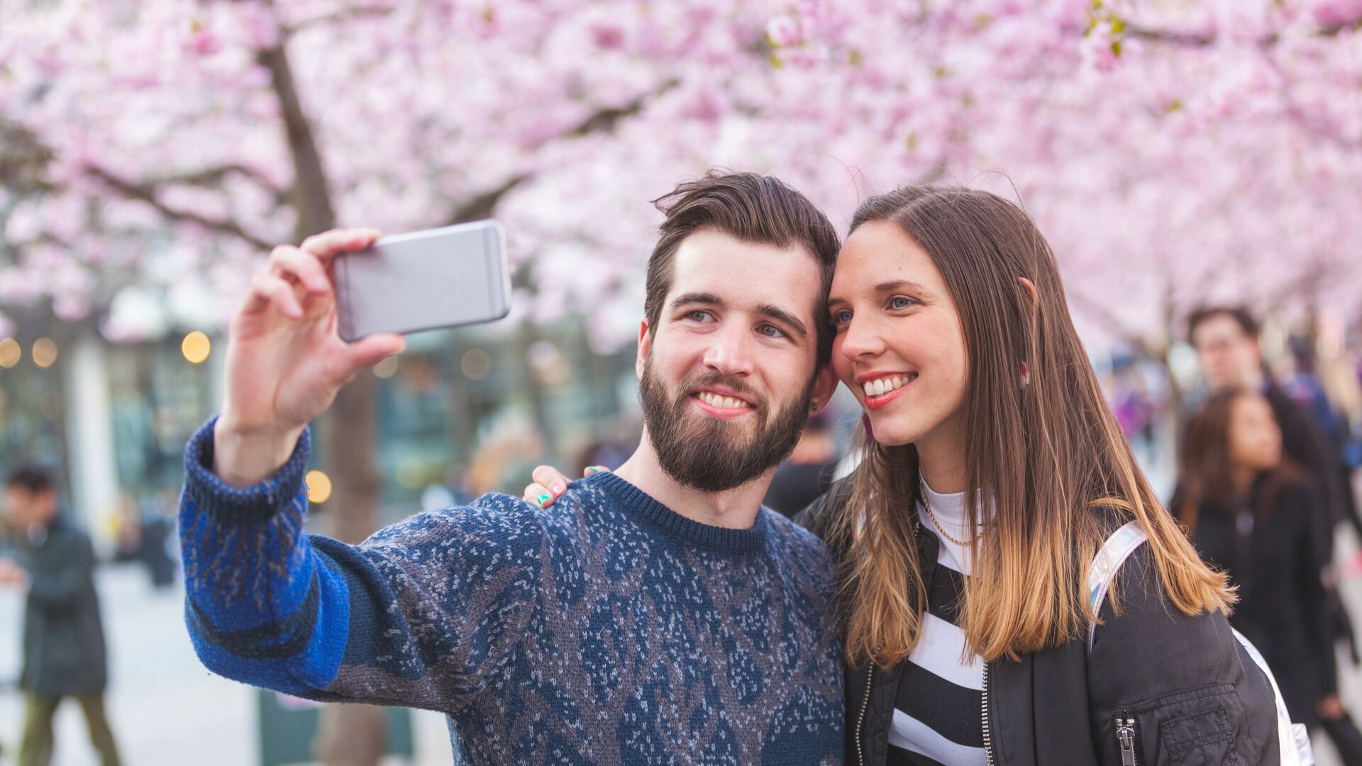 Man and woman taking a selfie 