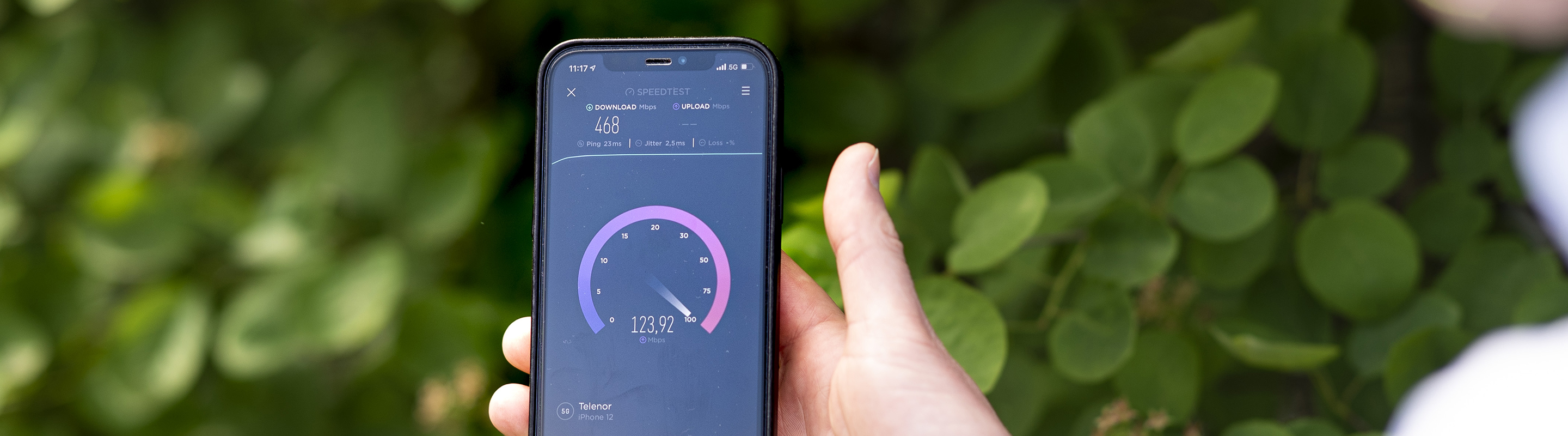 Mobile phone showing 5G speed test from Ookla