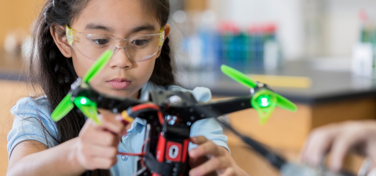 Girl working with a drone