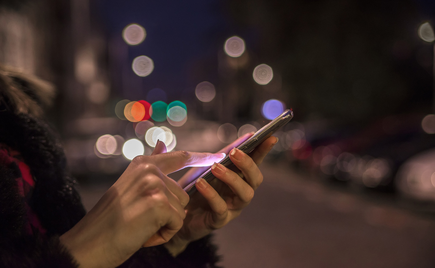 Woman browsing on mobile phone