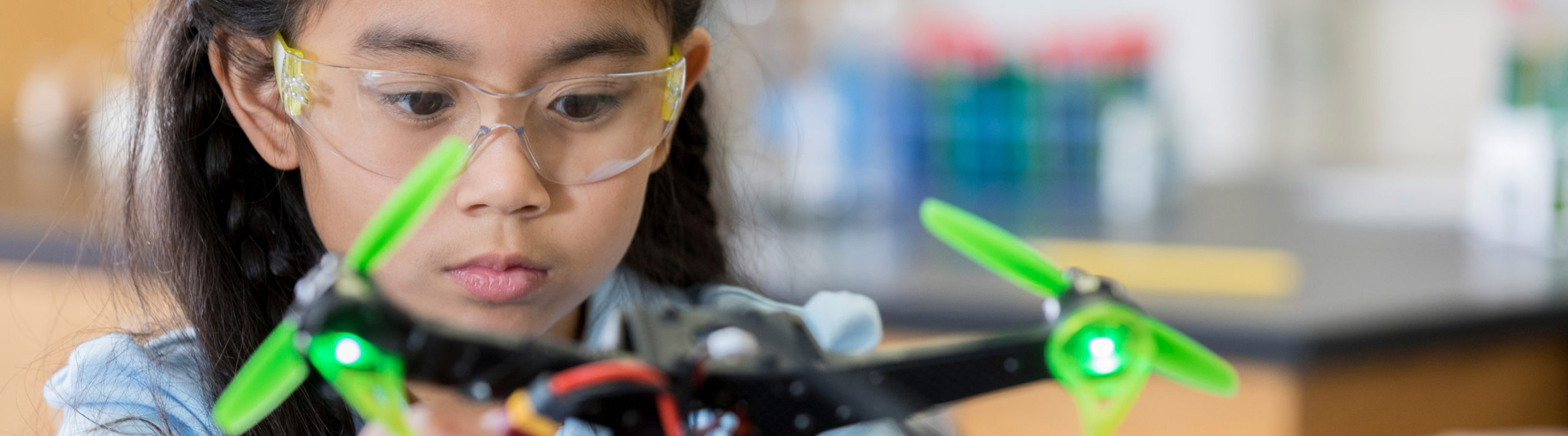 Girl working on a drone